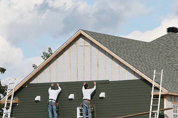 Professional Emergency Siding Repair technician working in East Springfield, PA